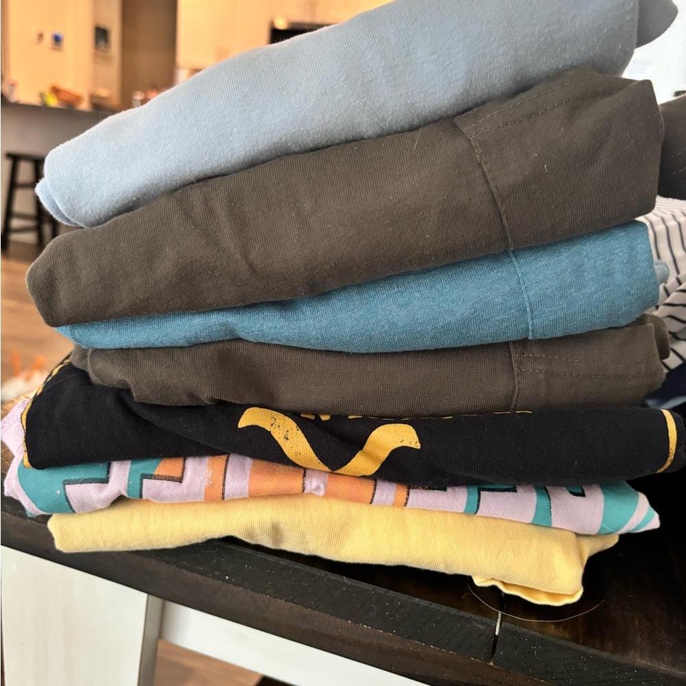 Stack of mens tshirts